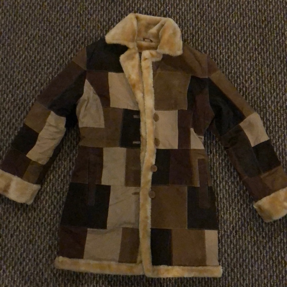 a vintage fur trench coat